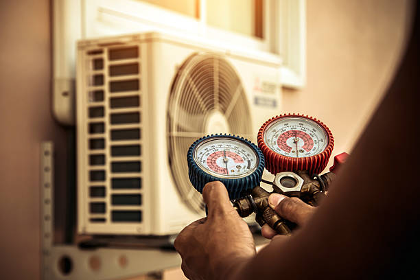Professional Hvac technician working in Howe, IN